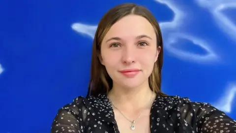 Charlotte Moore Charlotte Moore, a bouncer