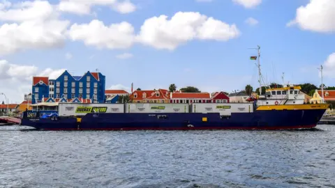 Getty Images The Midnight Stone supply ship arrives from Puerto Rico with aid to Venezuela, at the port of Willemstad, Curaçao, Netherlands Antilles, on February 24, 2019