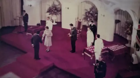 Narelda Jacobs Cedric Jacobs receiving his MBE from the Queen
