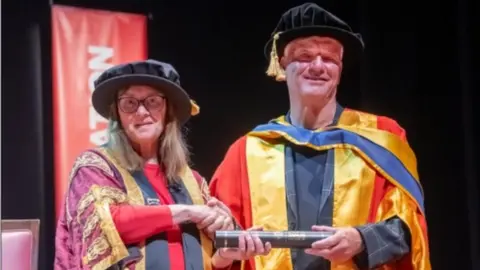 University of Salford Paul Stewart with University of Salford's vice chancellor Prof Helen Marshall