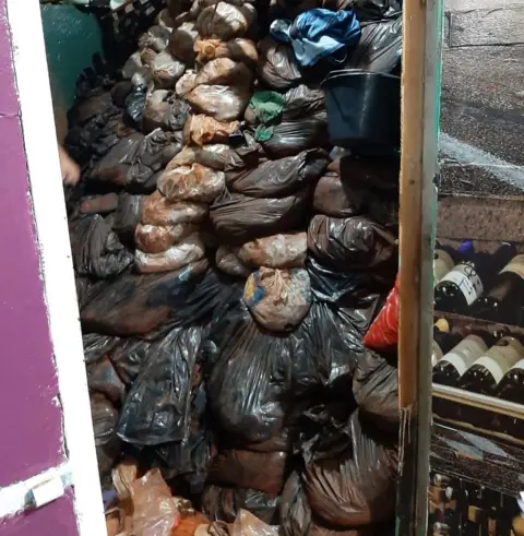 Paraguay's ABC Color Sandbags inside a cell