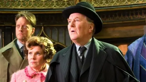 Warner Bros. Robert Hardy as Cornelius Fudge in Harry Potter
