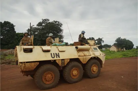 Zack Baddorf UN peacekeepers on patrol in an armoured tank
