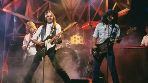 Status Quo (Rick Parfitt and Francis Rossi at left) performing on Top Of The Pops in 1980