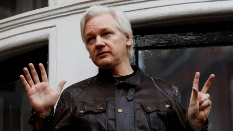 Reuters Julian Assange on the balcony of the Ecuadorian Embassy in London