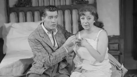 Getty Cuka acted opposite Michael Crawford in Same Time, Next Year at the Prince of Wales Theatre, London in 1976.