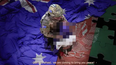 Twitter In a fake image, an Australian solider is seen murdering a child who is holding a lamb