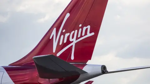 Getty Images Tail of Virgin aeroplane displaying the Virgin logo