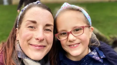 Kim Wyatt Kim Wyatt smiling to camera in picture with daughter Summer