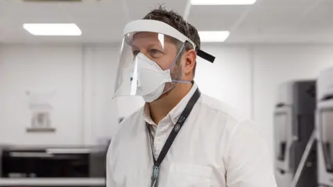 JLR Man wearing a mask