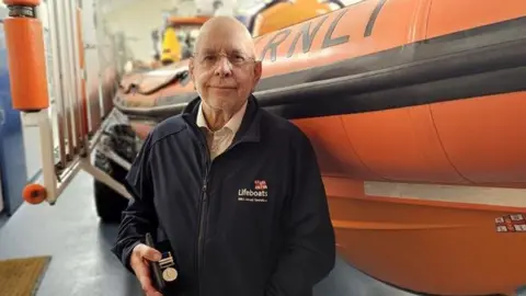 RNLI/Helier de Veulle Chris McFadyen, recognised for 40 years' service to the RNLI