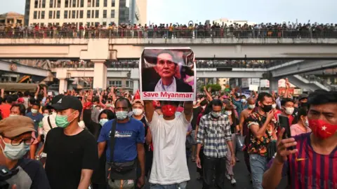 Reuters Demonstrators protest against the military coup and demand the release of elected leader Aung San Suu Kyi, in Yangon, Myanmar