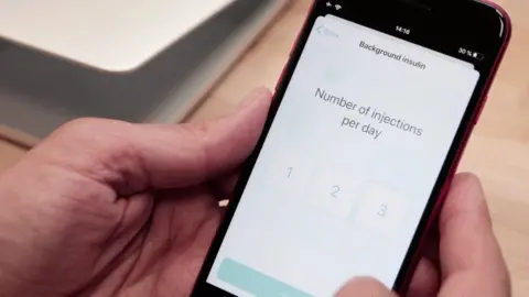 Quin Quin app on mobile phone