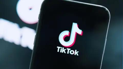 Getty Images TikTok logo on a phone