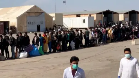 Afghan border camp, western Herat, crowded with returnees