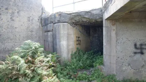 States of Jersey Police Swastika graffiti