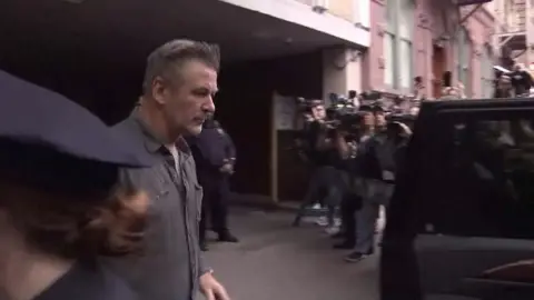 AFP Alec Baldwin leaves police station in New York