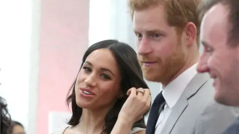 PA Prince Harry and Meghan Markle