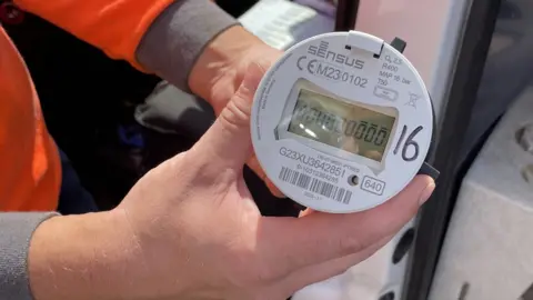 Ben Schofield/BBC A smart water meter
