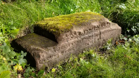 Historic England Archive Travellers' rest stone at Red Bank