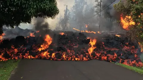 US Geological Survey Lava covers a tarmac road