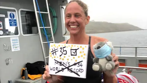 PA Chloe McCardel celebrates after her swim