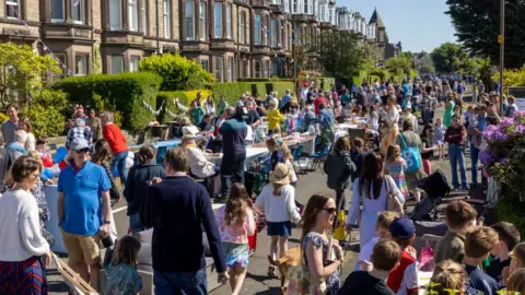 Getty Images Hundreds of people turned out for the party in Netherby Drive, Trinity