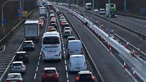 BBC Traffic queueing on one side of the M4