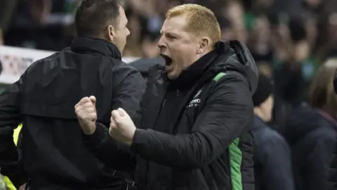 Hibs boss Neil Lennon celebrates a goal against Hearts