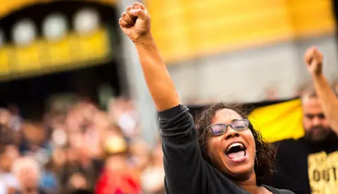 Getty Images A woman at a protest held on Australia Day in January