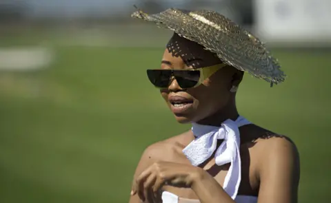 AFP A close up of a fashionably dressed female guest at Kenilworth Race Track in Cape Town, South Africa - Saturday 26 January 2019