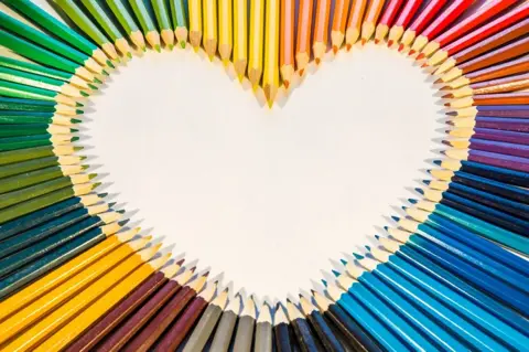 Getty Images Rainbow heart made of pencils