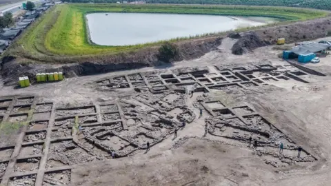 Israel Antiquities Authority Aerial view of the excavation site reveals an organized grid system of the ancient city.