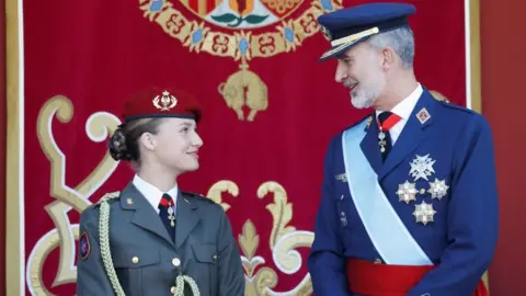 Reuters Spain's King Felipe VI and Princess Leonor attend a military parade to mark the country's National Day, in Madrid, Spain, October 12, 2023.