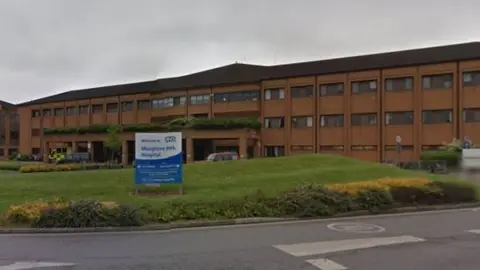 LDRS A hospital with a sign outside