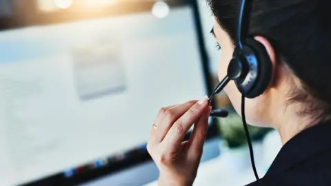 Getty Images Women talking on telephone headset