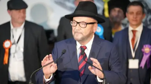 Getty Images George Galloway giving his victory speech