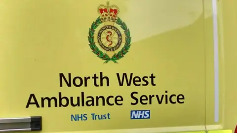 Side of North West Ambulance Service vehicle