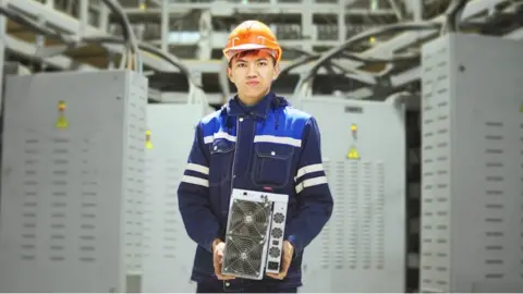 A worker at the Enegix crypto-mine near Ekibastuz, Kazakhstan