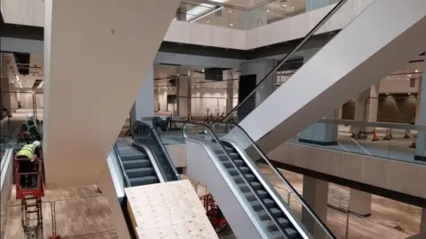 Queensgate An under-construction shopping unit with escalators