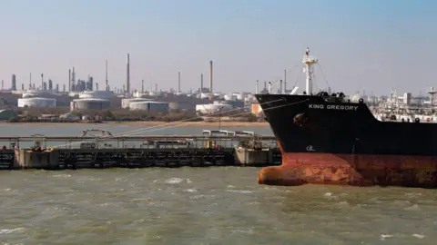 Getty Images Fawley, Southampton, England, UK, Chemical oil products tanker ship discharging cargo at Fawley oil refinery on Southampton Water