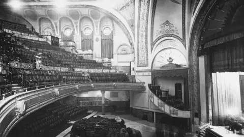 Getty Images Side view of seats and stage in the Liverpool Empire Theatre shortly before its opening in 1925