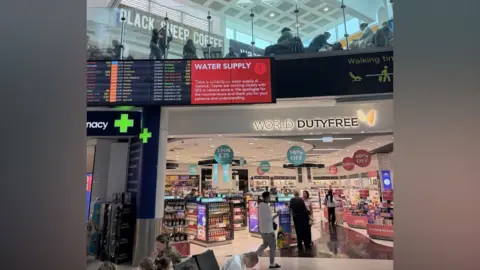 Supplied A red sign at Gatwick Airport which says "Water Supply" on it.