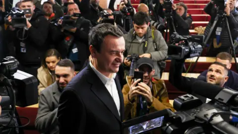 Incumbent Prime Minister Albin Kurti arrives at a polling station to cast his ballot during the parliamentary elections in Pristina, Kosovo. Photo: 9 February 2025