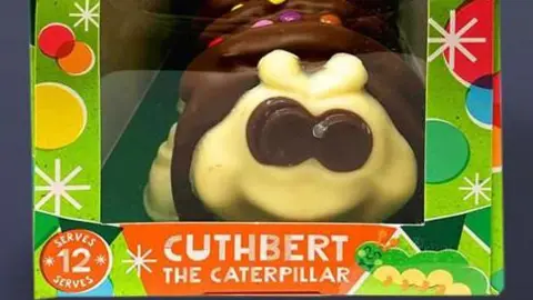 Aldi Box containing the Cuthbert the Caterpillar cake from Aldi.