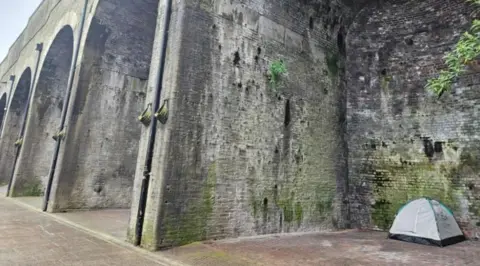 Aisha Iqbal/BBC Arches in Bradford with a tent