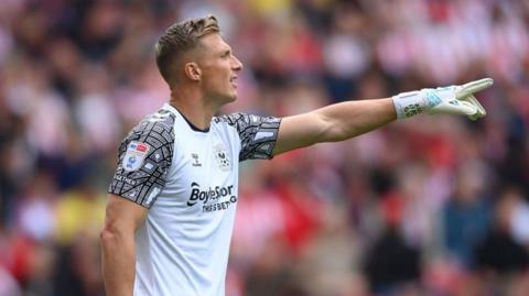 Coventry goalkeeper Simon Moore reacts during the Sky Bet Championship between Sunderland and Coventry City at Stadium of Light on July 31, 2022 in Sunderland, England. (