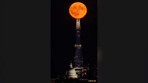 A supermoon above the Shard in London
