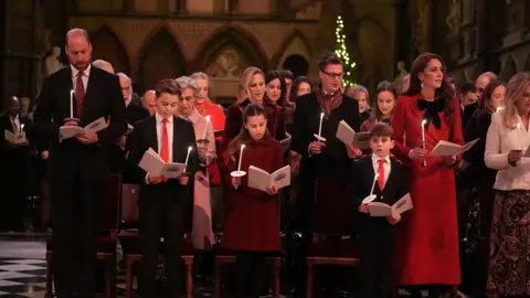 Aaron Chown/PA Wire The Princess was joined by her husband, the Prince of Wales and their children, Prince George, Princess Charlotte and Prince Louis. They each read from a hymn book and hold a candle.