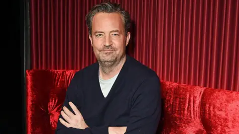 Getty Images Matthew Perry poses at a photocall for "The End Of Longing", a new play which he wrote and stars in at The Playhouse Theatre, on February 8, 2016 in London, England.